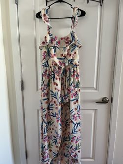 Floral romper with maxi train