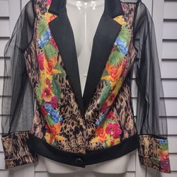B.C.B.C Blouse with flower prints of different colors, long black tulle sleeves with collar, the fabric on the back is tulle, two buttons on the front