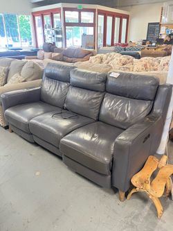 Dark gray leather power recliner couch (in store)