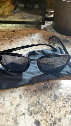 Woman’s cat eye cole hann sun glasses