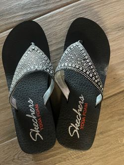 Like new sketcher flip-flops.