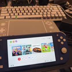 Nintendo Switch Lite With New Case And Games 