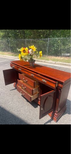 Solid wood long dresser with big drawers. Drawer sliding smoothly