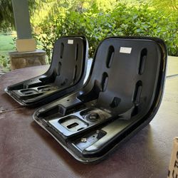 Two hard plastic seats