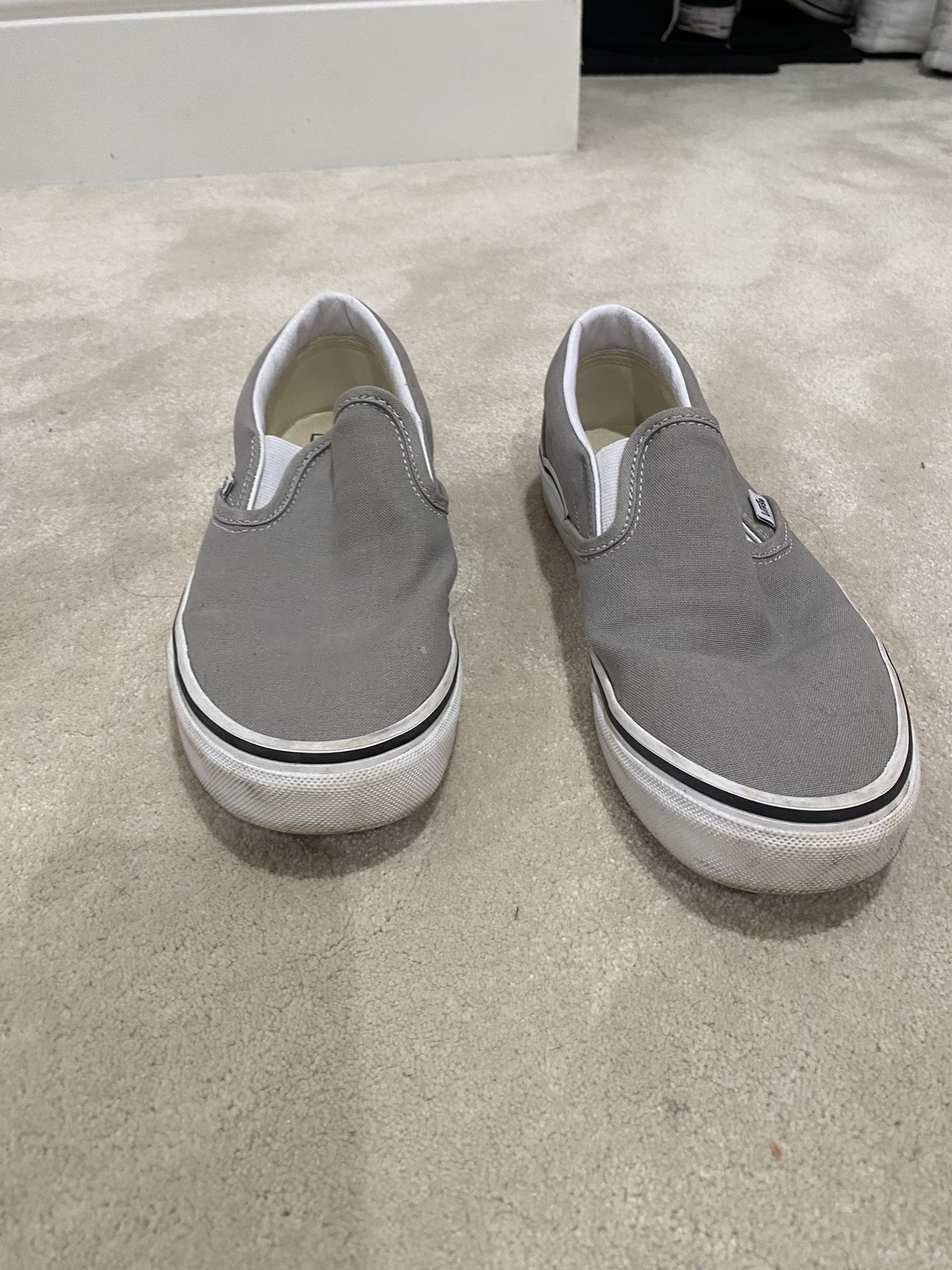 Vans slip on sneakers