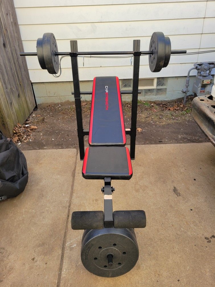 CAP STRENGTH BENCH WITH 100LB WEIGHTS