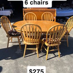 Table and chairs with leaf