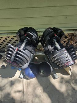 Adjustable boflex dumbells with rack