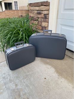 PAIR OF VINTAGE SUITCASES