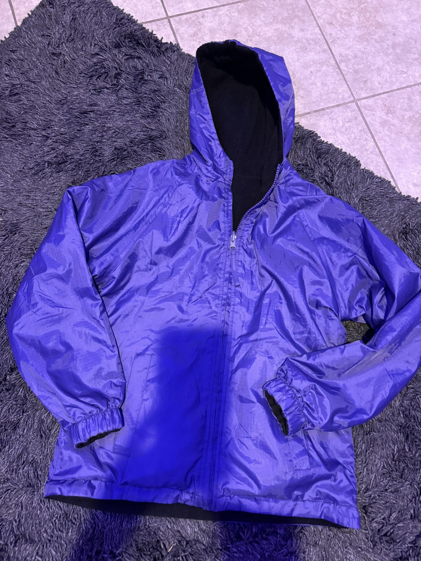 Girls Like New Purple Raincoat Size 10/12 Inside fleece for extra warmth and 2 front pockets