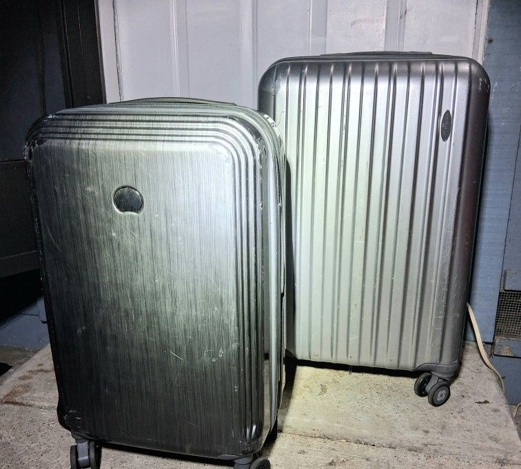 Two Expandable Rolling Hard Suitcases