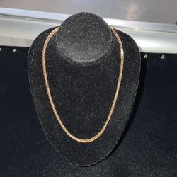 14k Miami Cuban style chain (price available upon request)
