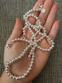 Silver necklace and bracelet