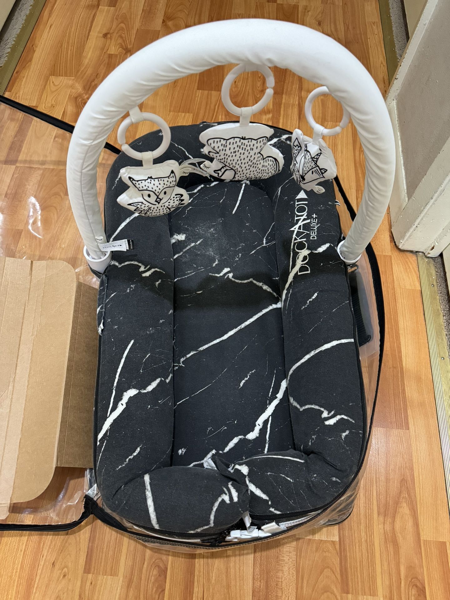DockATot Deluxe+ With Baby Mobil