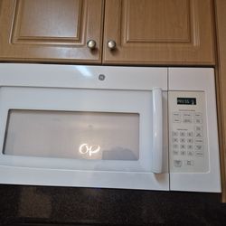 GE white Microwave in Hallandale