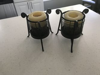 2 candle holders with candles