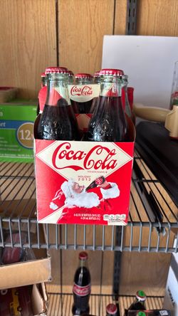 Coca Cola holiday 2012 four pack of 8 1/2 ounce bottles