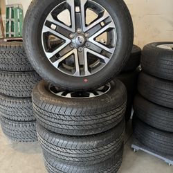 Brand new stock 20 inch Ford F150 6 lug wheels and tires 275/60/20 