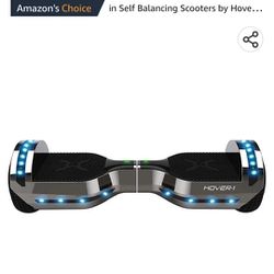Hover-1 Chrome 2.0 Electric Hoverboard | 6MPH Top Speed, 7 Mile Range, 4.5HR Full-Charge, Built-In Bluetooth Speaker, Rider Modes: Beginner to Expert
