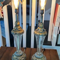 Pair of glass and brass-toned table lamps