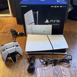 PlayStation 5 console with two controllers