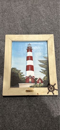 Framed Lighthouse Painting with Nautical Accent
