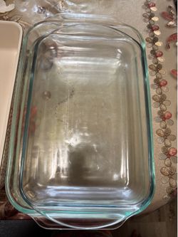 Pyrex rectangular glass baking dishes (specifically featuring the classic 3-quart / 9" x 13" model nesting with smaller sizes).