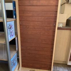 Slatwall kiosk two sides with wheels