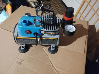Air brush air compressor.