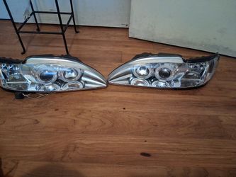 Ford Mustang 1(contact info removed) Dual Halo Projector Headlights.$20
