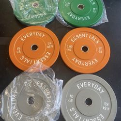 Three Pairs Of Bumper Weights, 25/15 And Tens Altogether 100 Pounds