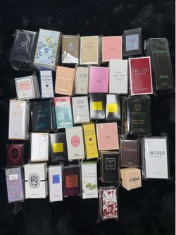 ✨ Brand New lot of 12 mini travel-size perfumes.