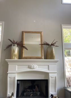 Mirror and two vases