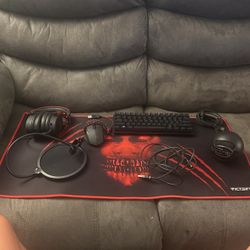Victsing Mousepad, Blue Snowball Mic, Mic Cover, Skytech Mouse, Razor Huntsman Mini Keyboard, And A HyperX Headset 