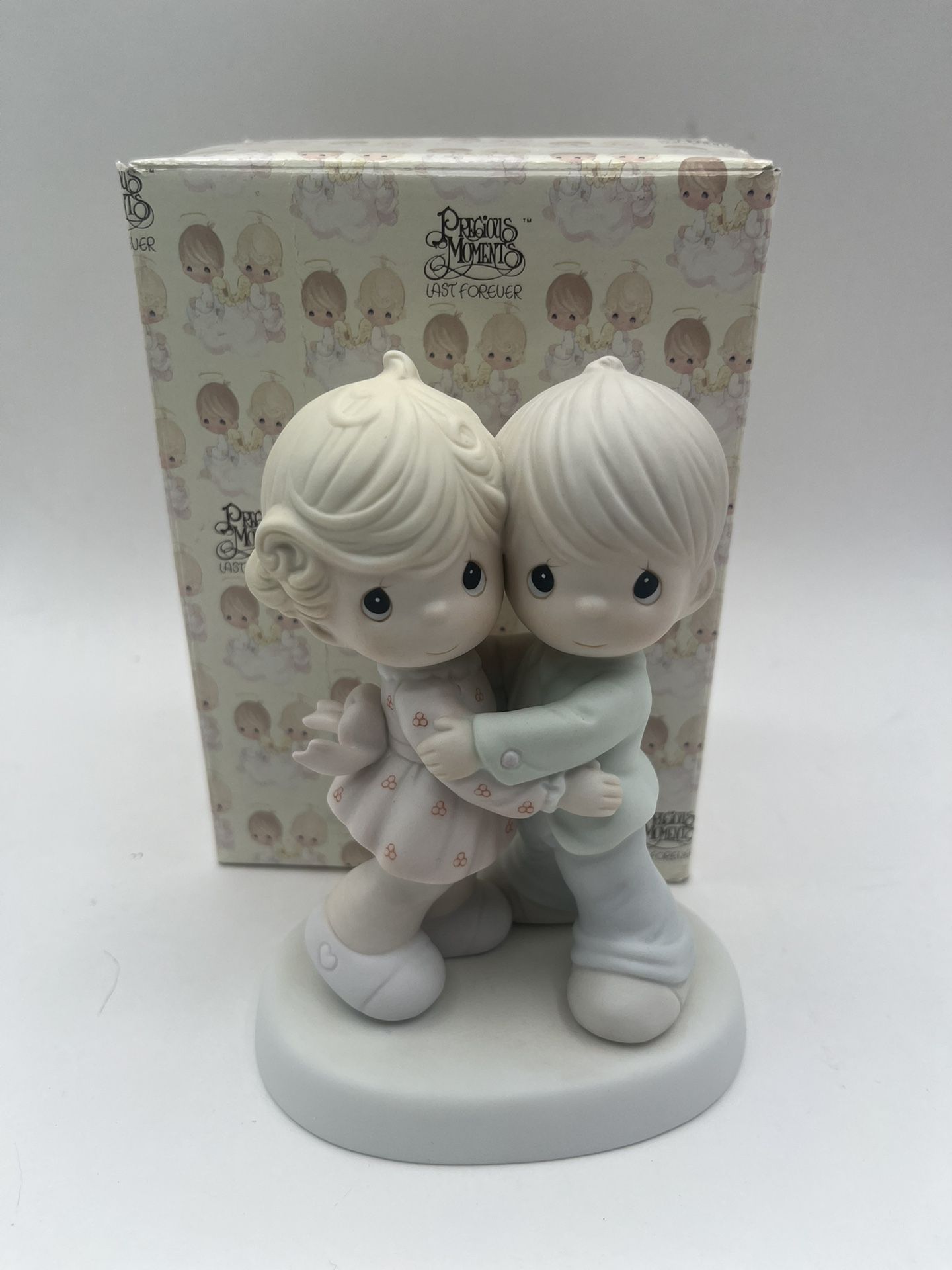 Precious Moments Collection “Hug One Another “ Height: 5.25”
