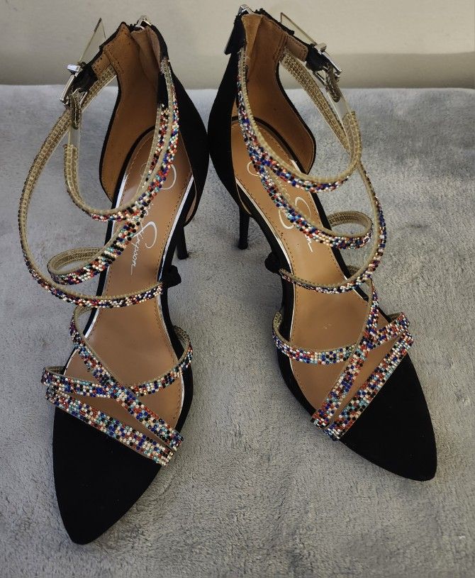 Jessica Simpson Wylanne pointed toe , strappy multicolored rhinestone heels with zippered closure, adjustable strap and buckle. Size : 9.5M Color: Mul