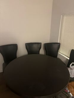 Dining room table with chairs