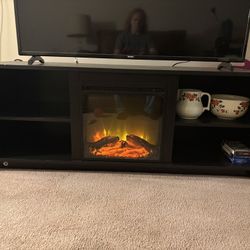 Entertainment Center With Electric Heater Fireplace Installed 