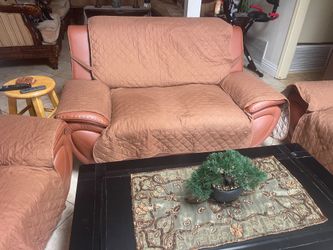 Brown Leather Loveseat with Quilted Cover (pick up and cash only)