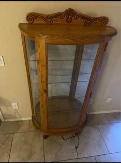 5 ft tall curio cabinet with light