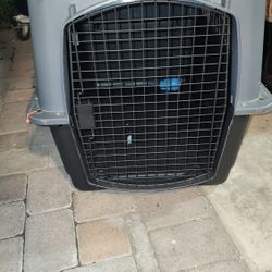 Dog kennel portable plastic 32" (Just used for 1 Flight 12 hours).