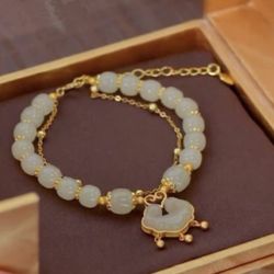 Brand new fashion jade bracelets size for all with pouch in golden tone