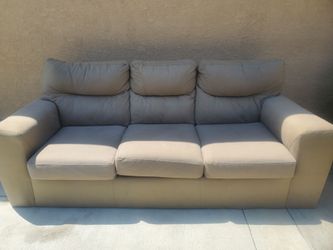 2 Beige Leather 3-Seat Sofa $100 Each