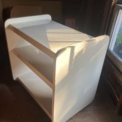 Rolling white shelf