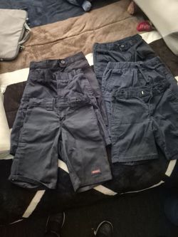 Short Escolar azul  talla (6,7) buen estado
