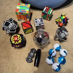 Set of rubik’s cubes , maze ball, fidgets, etc.