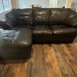 Black Leather Sofa And Ottoman