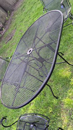 Wrought iron table set was recently painted