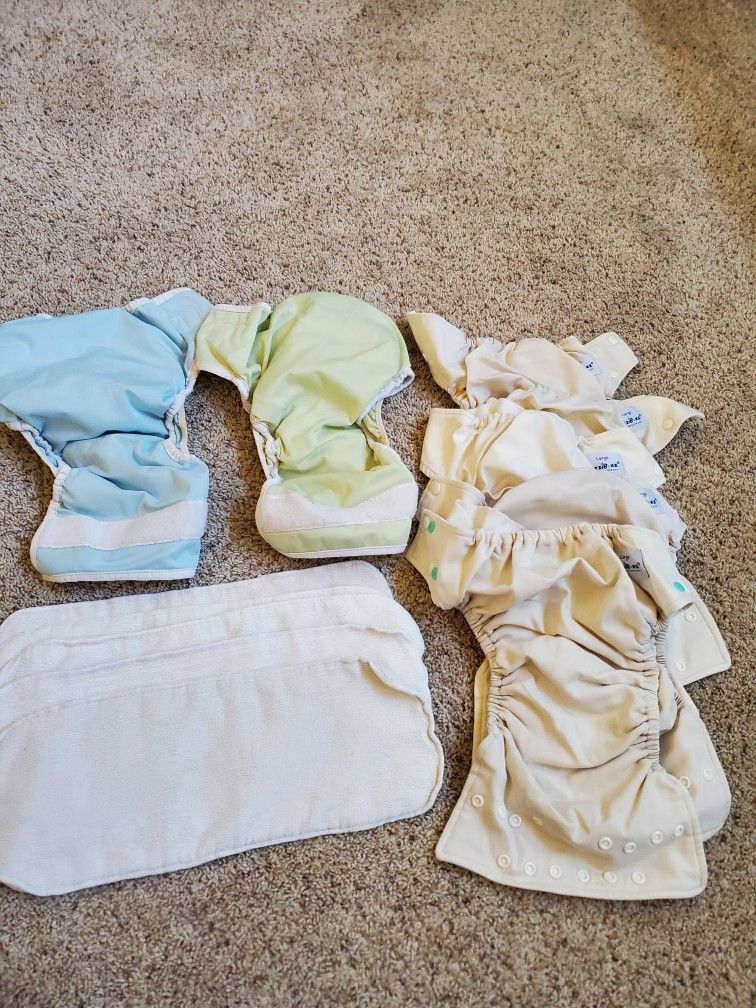 7 Preowned Cloth Diapers Size L