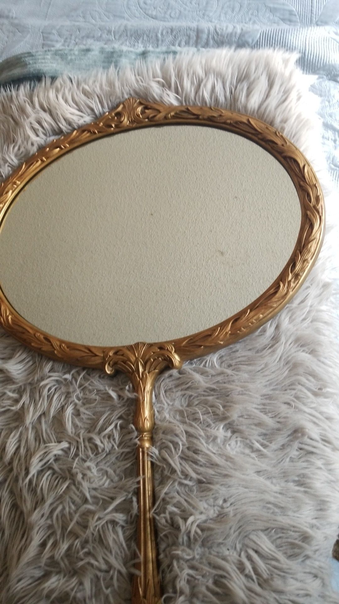 Vintage gold oval mirror